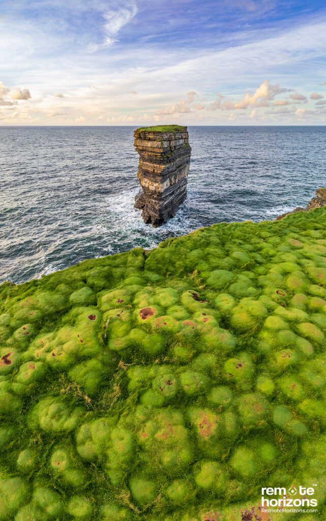 Aerial landscape photograph of Dun Briste sea-stack, Downpatrick Head, County Mayo, Ireland.  This shows the unique dimpled landscape at the cliff edge.