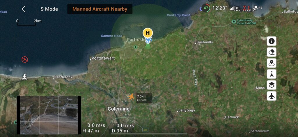 DJI Fly app showing Manned Aircraft Nearby warning with DJI Airsense for landscape photography