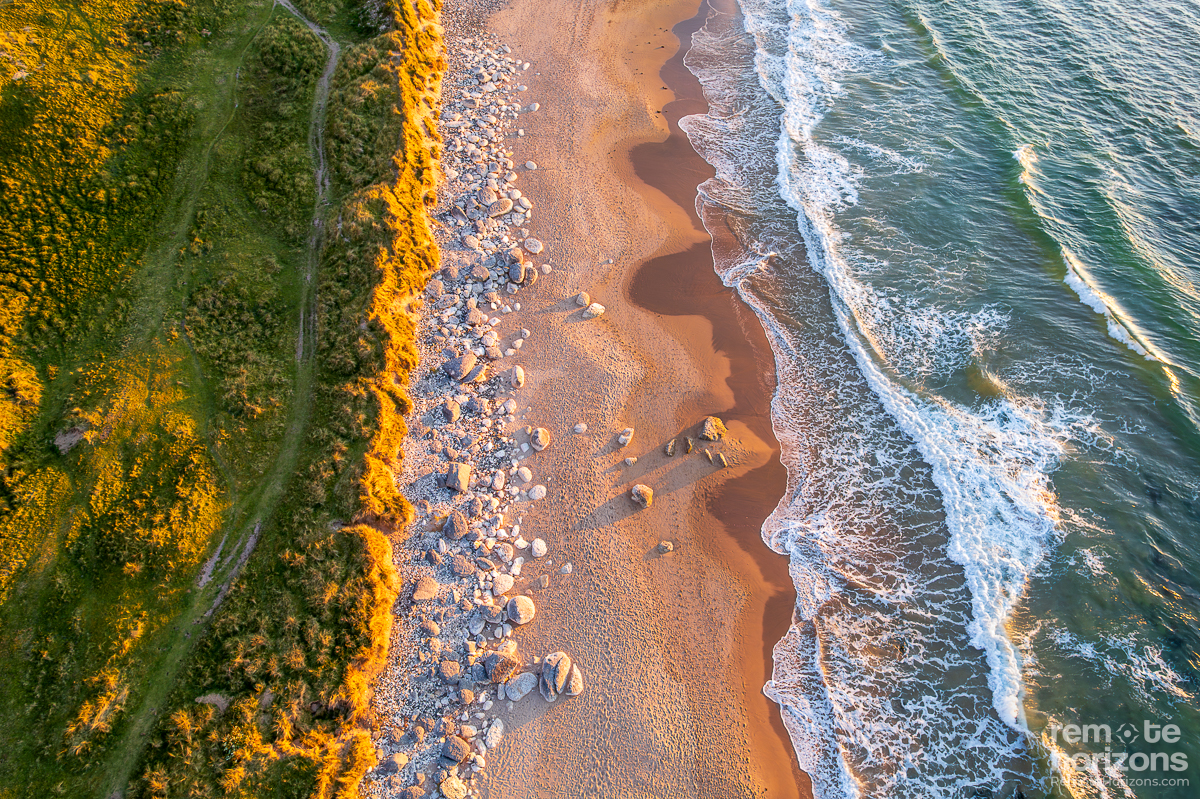 Aerial landscape photograph of White Park Bay, Northern Ireland