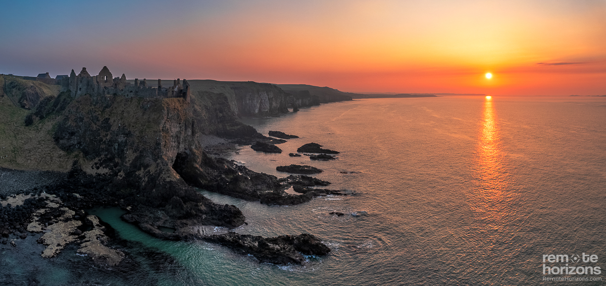 Aerial landscape photograph of Dunluce Castle, Northern Ireland